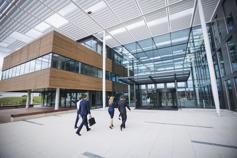 business-people-entering-office-building-2.jpg